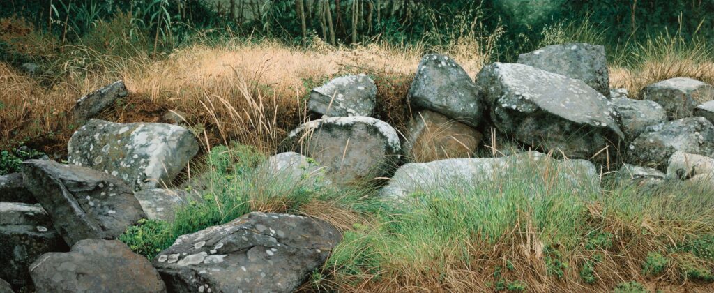 Large-scale hyperrealist acrylic painting depicting stone arrangement resembling a duck nest within grassy natural landscape by Armando Zesatti.